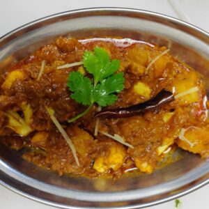 Vegan Aloo Gobi (Potato Cauliflower)  is a smooth medley of potato Cauliflower onions cooked in spices, ginger turmeric cumin, garlic Nut & Gluten free