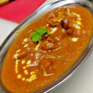 Chicken Curry Halal Bone-in Chicken Meat Marinated in Yogurt, sour cream Spice and then  slow cooked in onion, tomato curry & spices