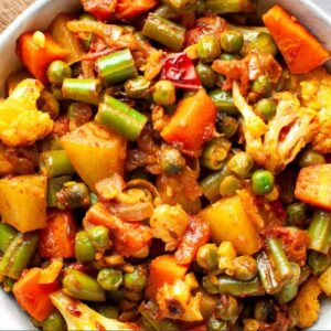 Vegan Mixed Vegetable Masala Curry is Nut & Gluten free curry are Seasonal mixed vegetables cooked in onions spices, ginger with spices in Indian style 